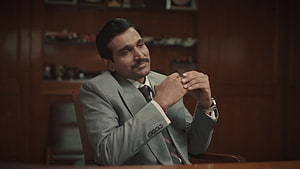 Pratik Gandhi as Harshad Mehta in Scam 1992 The Harshad Mehta Story HD wallpaper