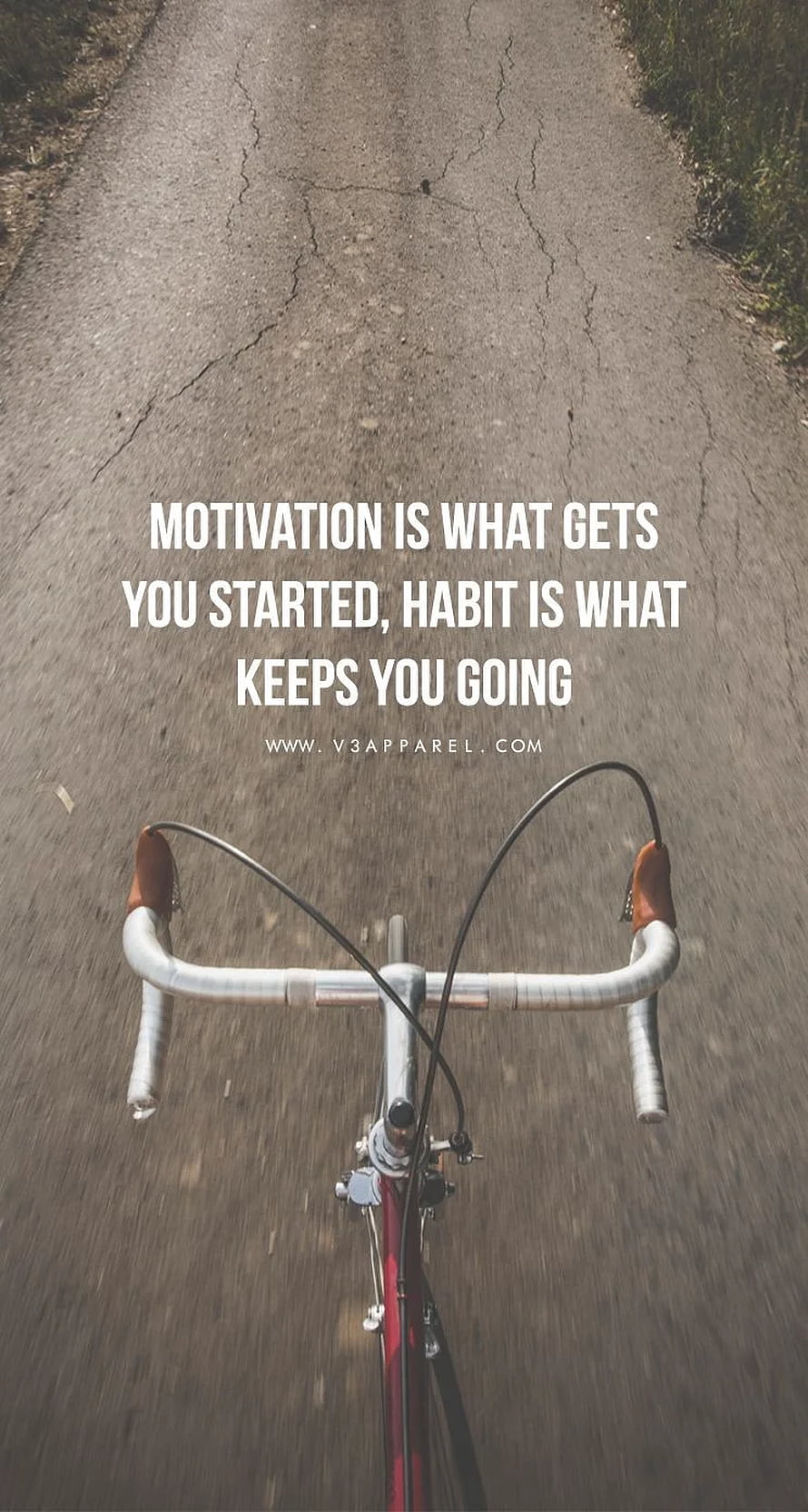 First-person view of a road bike handlebar on a cracked asphalt path with an inspirational quote overlay HD phone wallpaper