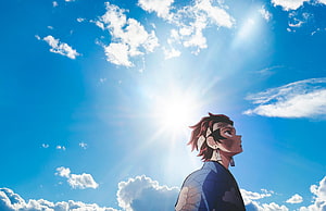 Tanjiro Kamado from Demon Slayer Gazing at Bright Sunlit Sky HD wallpaper