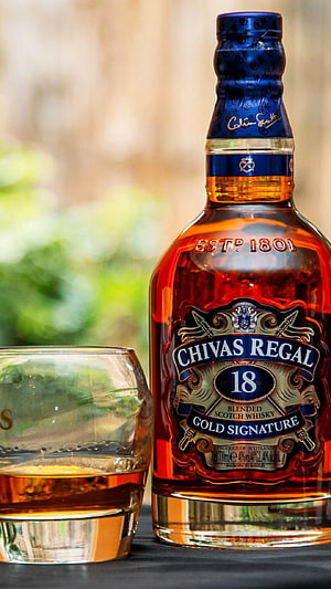 Chivas Regal 18 Gold Signature Blended Scotch Whisky Bottle and Glass HD phone wallpaper