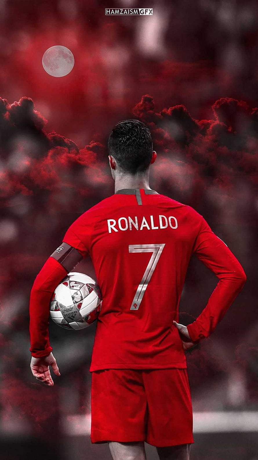 Cristiano Ronaldo in Red Portugal Kit Holding Ball Under Dramatic Red Sky HD phone wallpaper