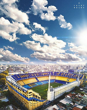 Aerial View of La Bombonera Stadium in Buenos Aires Under a Bright Blue Sky HD phone wallpaper