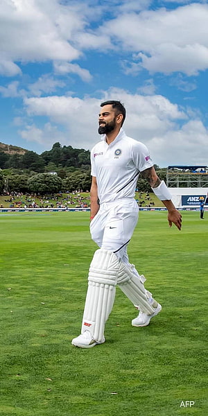 Virat Kohli Walking on the Cricket Field in White Test Kit HD phone wallpaper