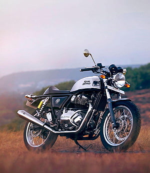 Royal Enfield Continental GT 650 Cafe Racer Motorcycle in Golden Hour Landscape HD phone wallpaper
