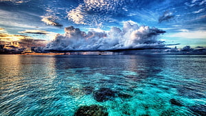 Tropical Ocean Horizon With Dramatic Storm Clouds And Turquoise Shallow Waters HD wallpaper