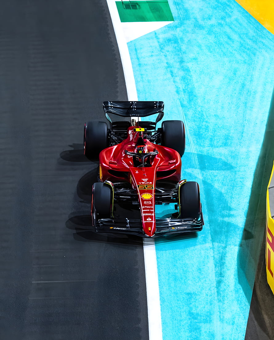 Ferrari SF-22 Formula 1 Car Number 55 Cornering on Race Track HD phone wallpaper