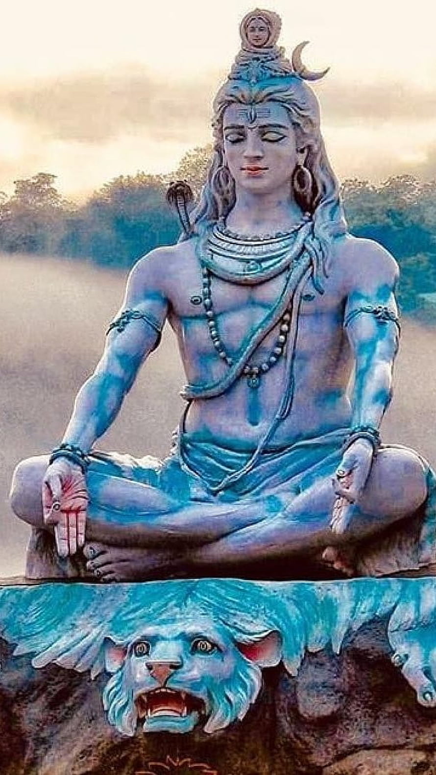 Lord Shiva Meditating on a Lion Pedestal with Serpent and Crescent Moon HD phone wallpaper