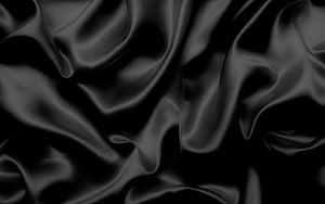 Elegant Black Silk Fabric Texture with Flowing Satin Folds and Soft Sheen HD wallpaper