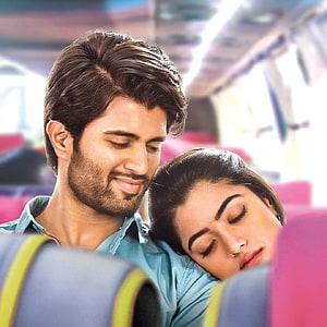 Vijay Devarakonda and Rashmika Mandanna sharing a tender moment on a train HD phone wallpaper