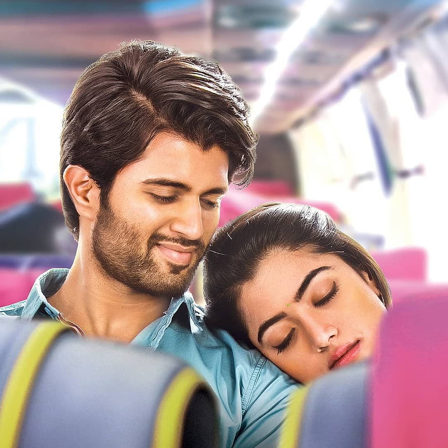 Vijay Devarakonda and Rashmika Mandanna sharing a tender moment on a train HD phone wallpaper