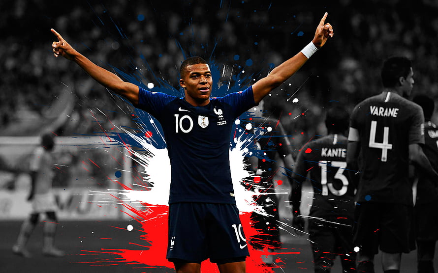 Kylian Mbappé Celebrating in France National Team Kit with Paint Splash Effect HD wallpaper