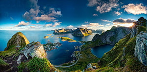 Aerial View of Dramatic Norwegian Fjord with Steep Green Cliffs and Coastal Village HD wallpaper