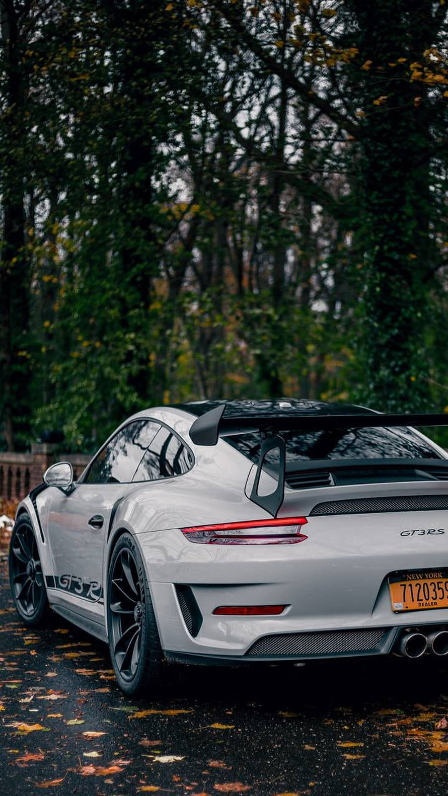 Rear Three-Quarter View of a White Porsche 911 GT3 RS Parked on a Wet Autumn Road HD phone wallpaper