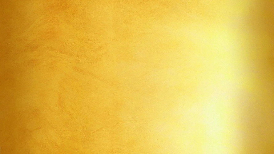 Warm Golden Texture with Soft Light Gradient and Subtle Surface Grain HD wallpaper