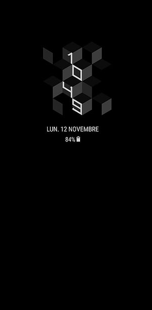 Minimalist Isometric Cube Clock Display on Black Background HD phone wallpaper