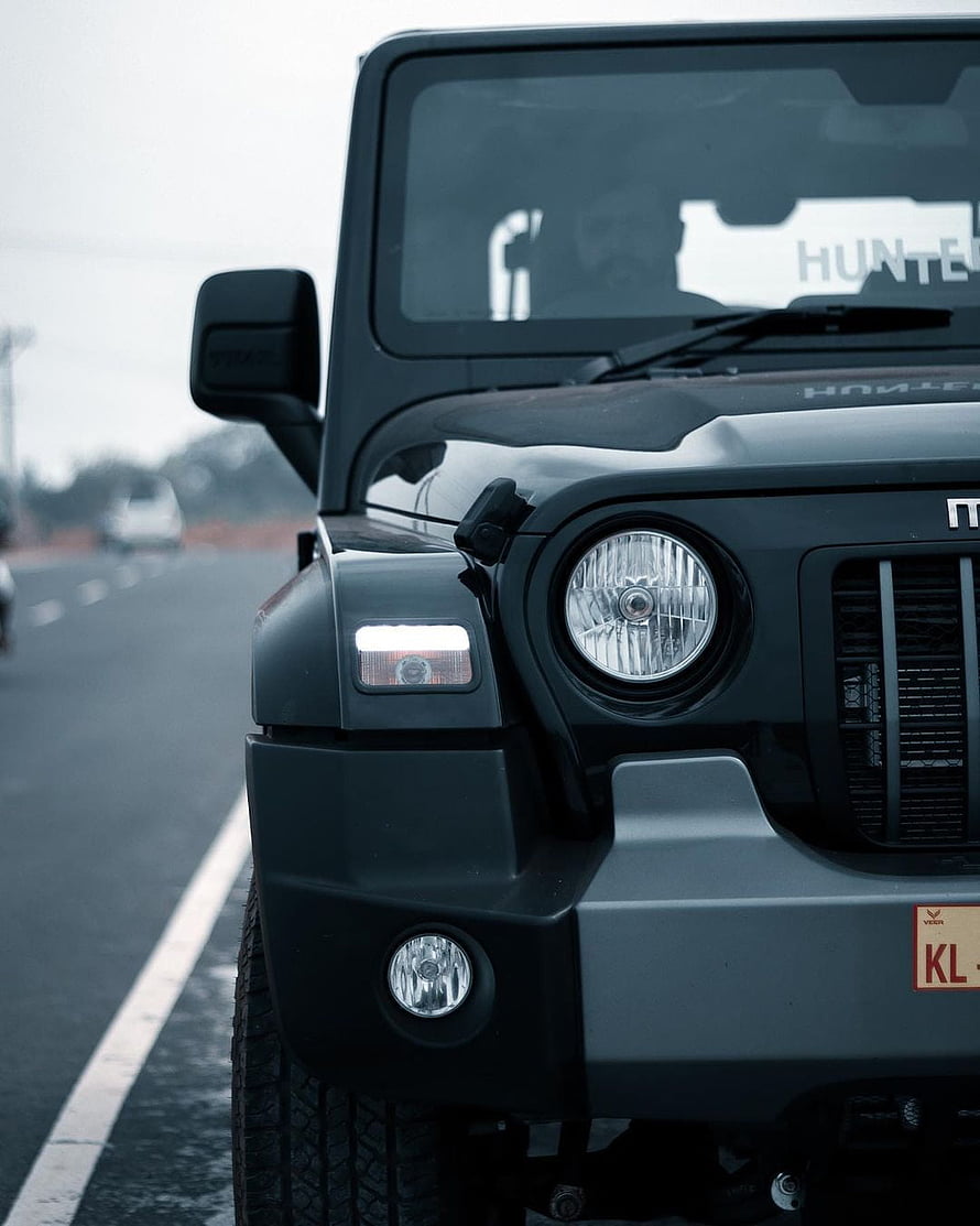 Mahindra Thar 2020 Front Grille and Headlight Close-Up on Highway HD phone wallpaper