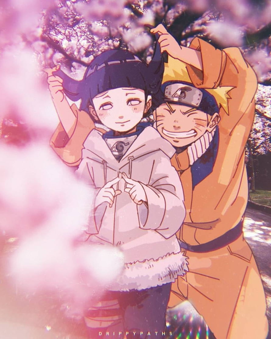 Naruto and Hinata Sharing a Playful Moment Under Cherry Blossoms HD phone wallpaper