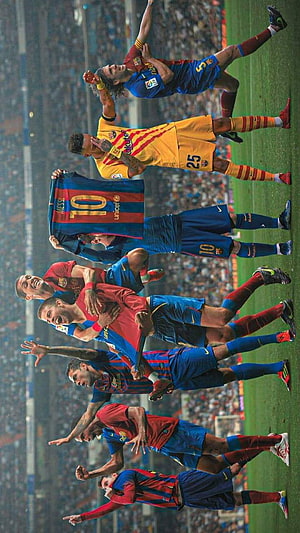 Lionel Messi and Barcelona Legends Celebrating on the Pitch HD phone wallpaper