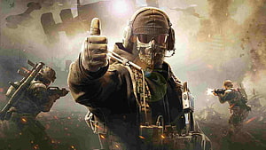 Call of Duty Soldier Giving Thumbs Up in Battlefield with Teammates Firing Weapons HD wallpaper