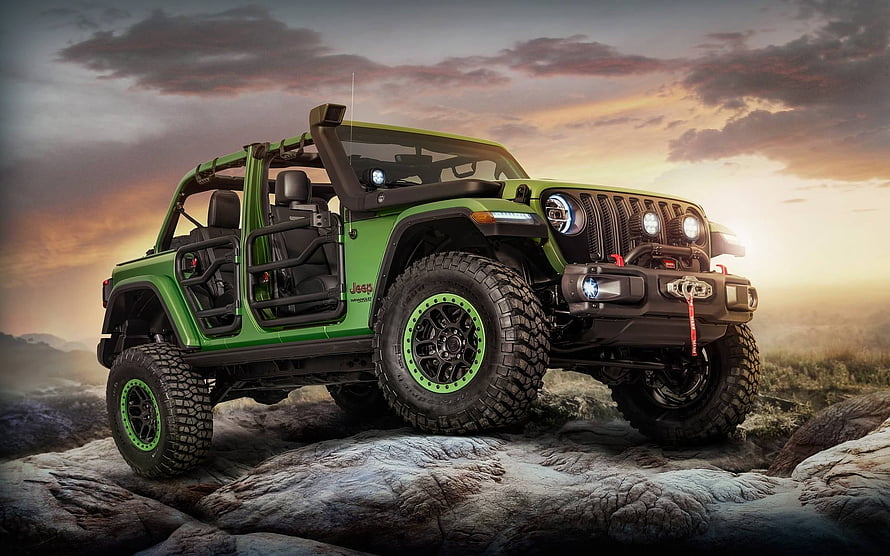 Green Jeep Wrangler Rubicon on Rocky Terrain at Sunset HD wallpaper