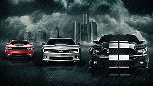 Dodge Challenger, Chevrolet Camaro, and Ford Mustang Shelby GT500 in a Dramatic Rainstorm HD wallpaper