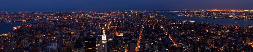 Aerial Night View of Manhattan Skyline Featuring the Chrysler Building and City Lights HD wallpaper