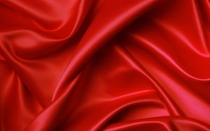 Flowing Red Satin Fabric with Elegant Folds and Glossy Sheen HD wallpaper