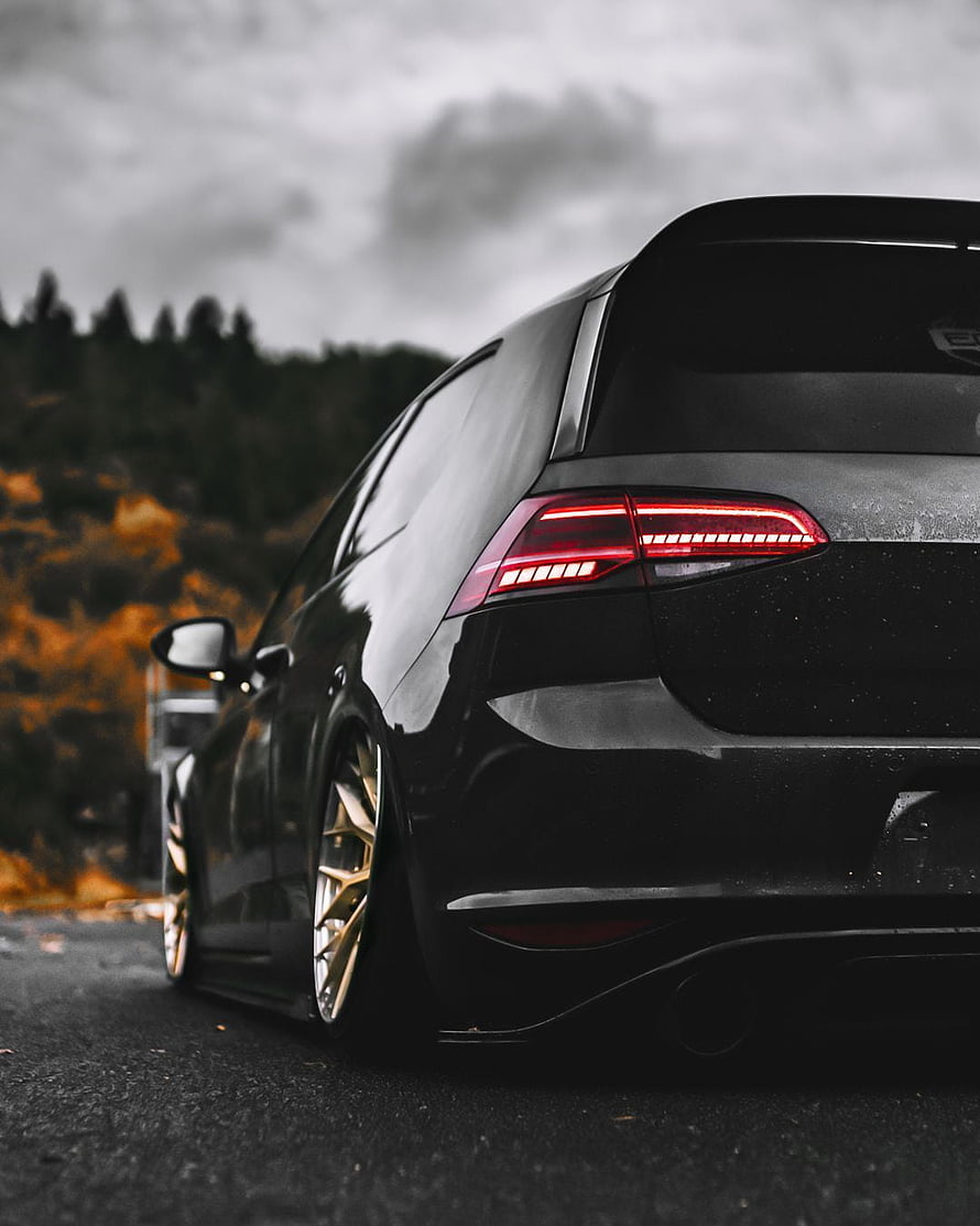 Rear Three-Quarter View of a Black Volkswagen Golf GTI Clubsport with Gold Wheels HD phone wallpaper