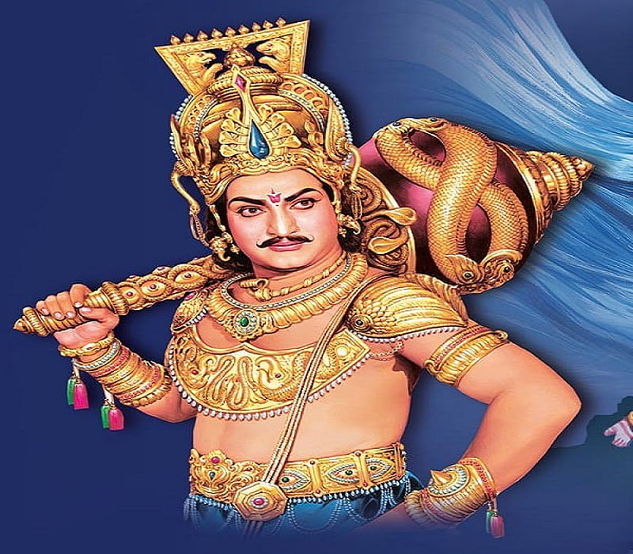 NTR as Rama in ornate golden armor holding a mace with a coiled serpent on his shoulder HD wallpaper