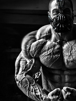 Black and white portrait of a muscular bodybuilder wearing a tactical mask HD phone wallpaper