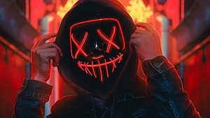 Person Wearing Glowing Red LED Mask in Dark Hoodie with Neon Background HD wallpaper