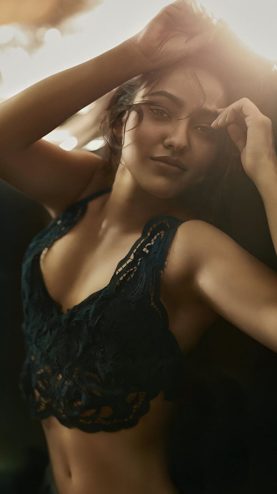 Neha Sharma in a Black Crochet Top with Warm Backlit Sunlight HD phone wallpaper
