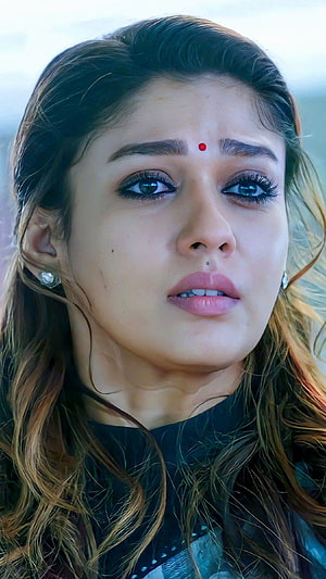 Nayantara Portrait with Red Bind and Windblown Hair HD phone wallpaper