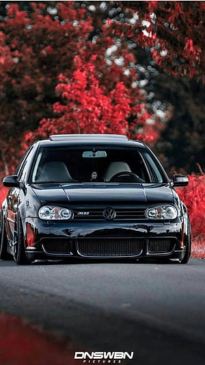 Black Volkswagen Golf Mk4 R32 Front View on Road with Red Autumn Foliage HD phone wallpaper