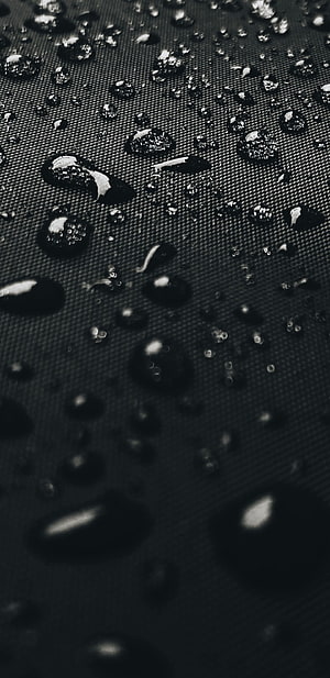 Macro Photography of Water Droplets on a Dark Textured Surface HD phone wallpaper