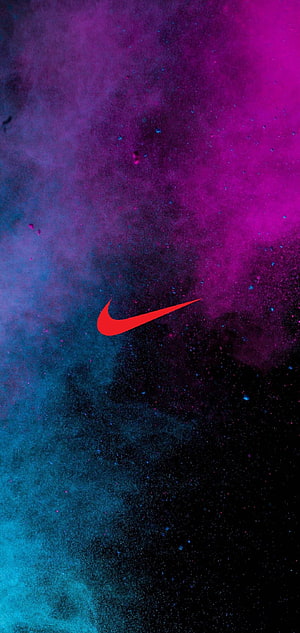 Nike Swoosh Logo on Vibrant Purple and Blue Cosmic Dust Background HD phone wallpaper