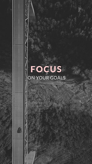 Aerial View of a Single Car on a Highway Bridge Through a Dark Forest with Motivational Text Overlay HD phone wallpaper