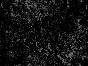 Dark Grunge Texture with Rough Organic Surface and Deep Black Tones HD wallpaper