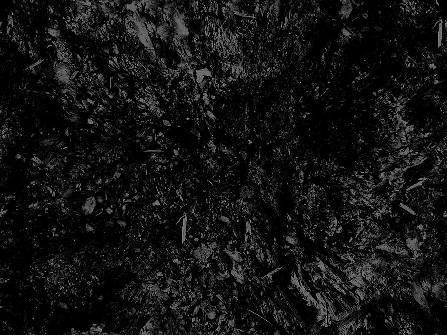Dark Grunge Texture with Rough Organic Surface and Deep Black Tones HD wallpaper