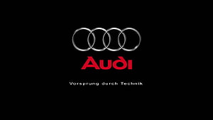 Audi Four Rings Emblem with Red Wordmark on Black Background HD wallpaper