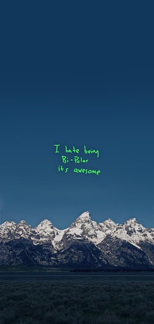 Snow-Capped Mountain Range Under Deep Blue Sky With Green Handwritten Text Overlay HD phone wallpaper