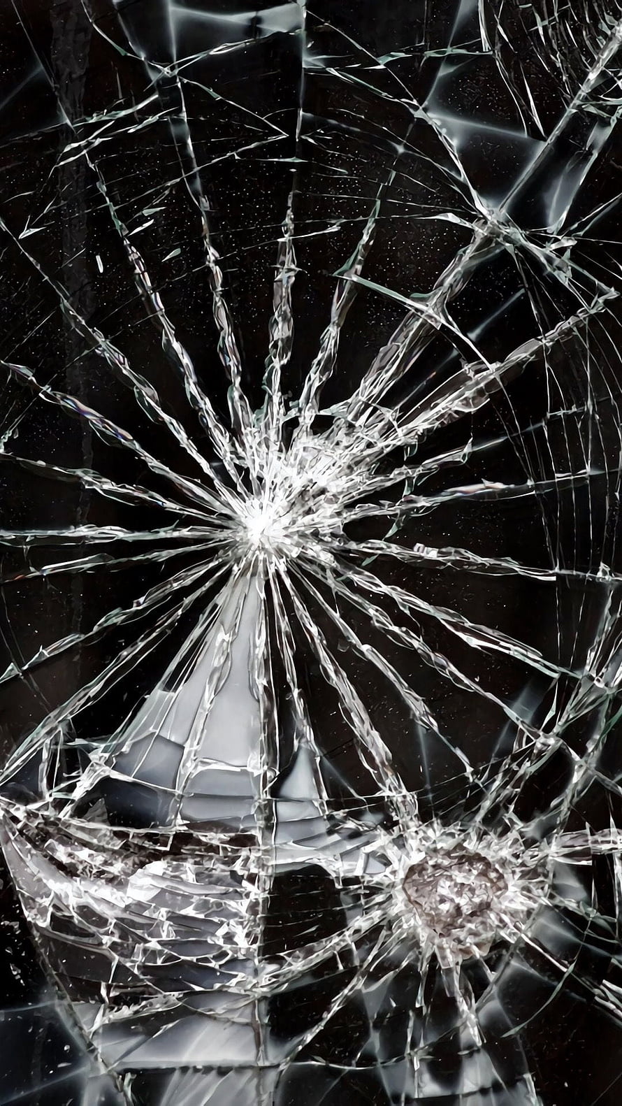 Shattered Glass Texture with Radiating Cracks on Dark Background HD phone wallpaper
