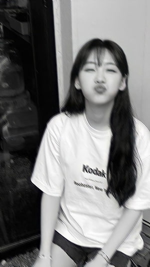 Cho Yi Hyun in a white Kodak t-shirt making a playful pouty face in a black and white portrait HD phone wallpaper