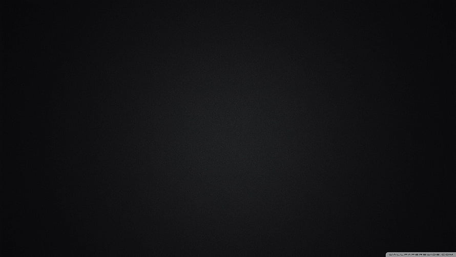 Minimalist Plain Black Background with Subtle Texture and Soft Vignette HD wallpaper