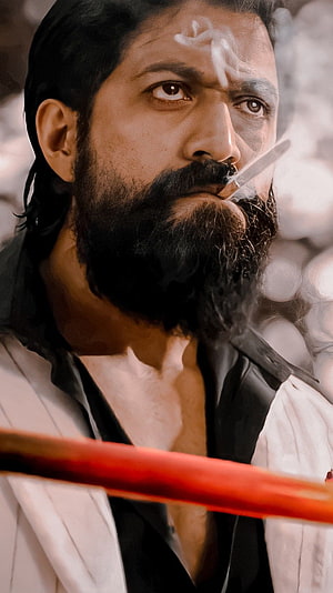 Yash as Rocky in KGF Chapter 2 with cigarette and intense expression HD phone wallpaper