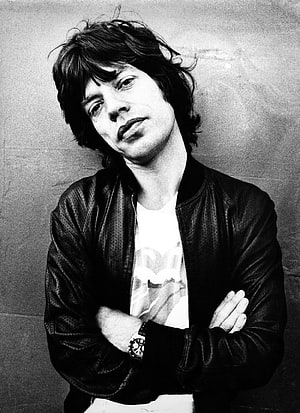 Mick Jagger Black and White Portrait in Leather Jacket with Arms Crossed HD phone wallpaper