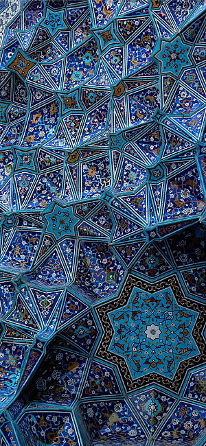 Intricate Persian Muqarnas Ceiling with Blue Floral Tilework and Geometric Star Patterns HD phone wallpaper