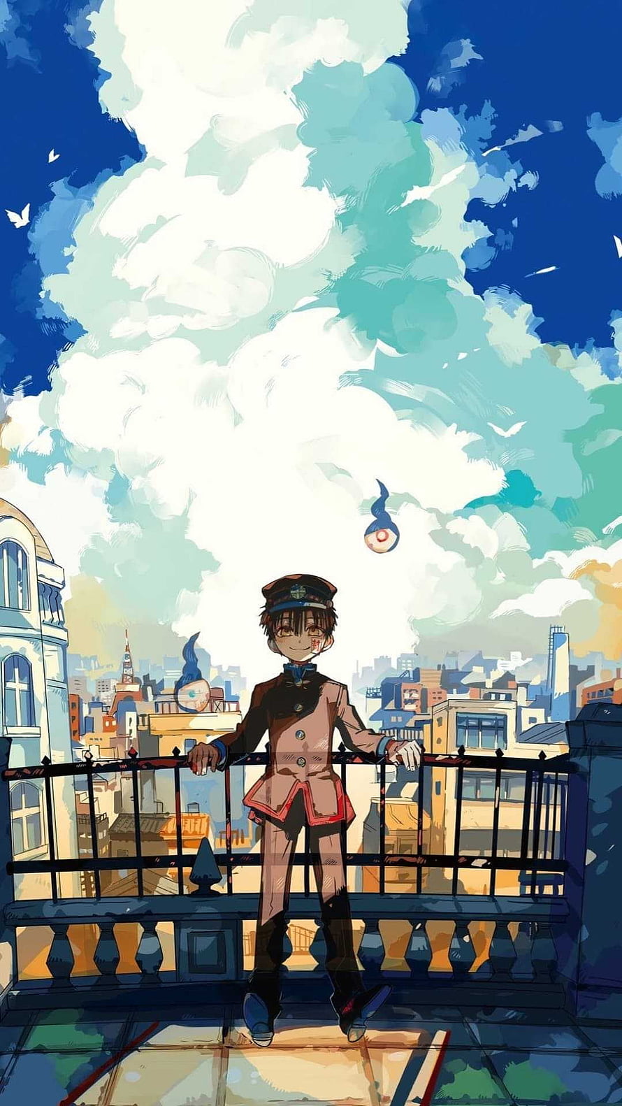 Hanako Kun anime character on a rooftop balcony overlooking a city skyline under a vast blue sky HD phone wallpaper