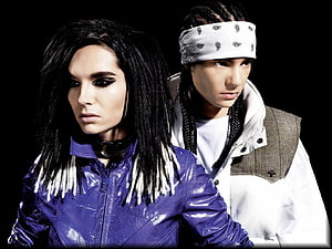 Tokio Hotel duo portrait in edgy fashion with bold makeup and layered jackets HD wallpaper