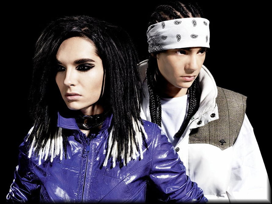 Tokio Hotel duo portrait in edgy fashion with bold makeup and layered jackets HD wallpaper